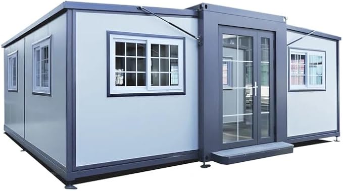 Compact and modern modular mini home with white and blue exterior, featuring multiple windows and a glass door. A great option for those interested in mini homes for sale or a mini home for sale.